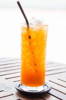 Full glass of fresh iced orange juice