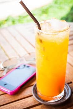 Summer fresh time with orange juice and straw
