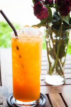 Fresh iced orange juice in home garden