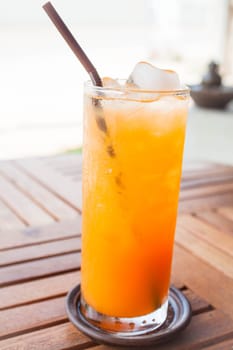 Fresh time with orange juice in home garden