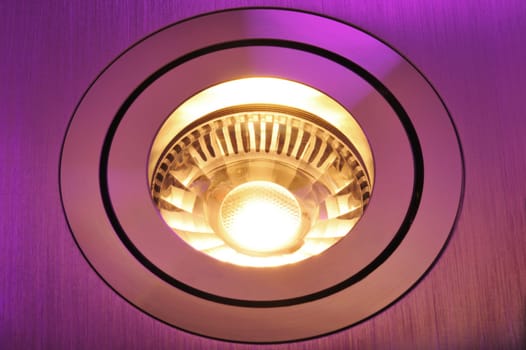 Macrodetail of a warm white COB LED in pink light