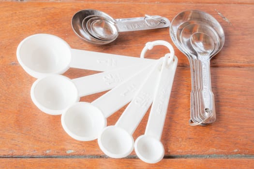 Many types of bakery  measuring spoons on wood table