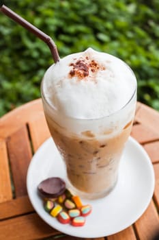 Refreshing iced milk coffee and some sweet
