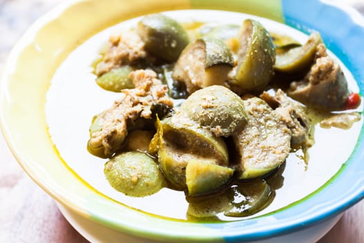 A bowl of spicy green curry, thai traditional food