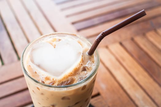 Cold coffee drink with heart ice cube
