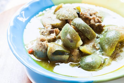A bowl of spicy green curry, thai traditional food