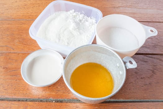 Set of baking ingredients flour, butter, sugar and milk