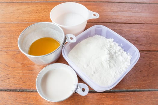 Set of baking ingredients flour, butter, sugar and milk