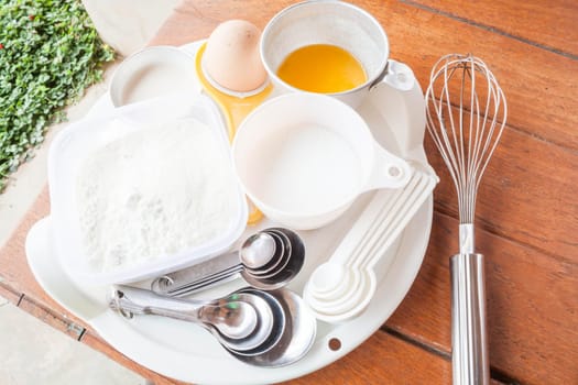 Set of baking ingredients with measure spoon