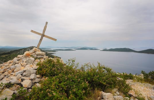 Summit cross in Croatian island world near Zadar