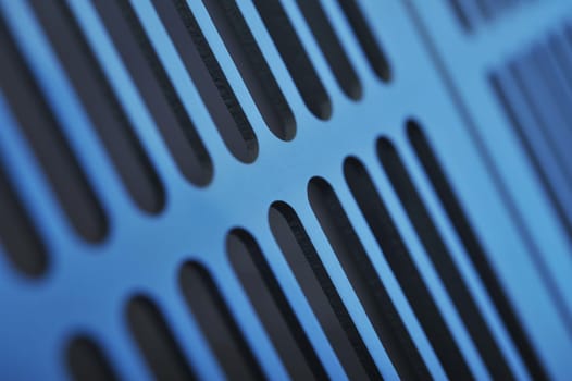 abstract industrial background made of aluminium ventilation grilles