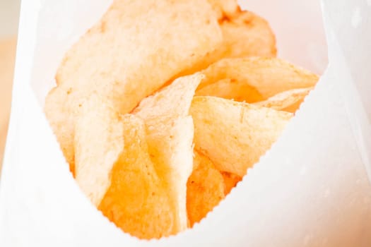 Close up opened bag of potato chips