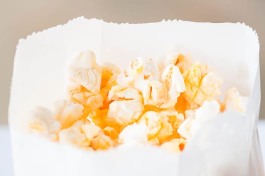 Fresh classic butter popcorn in paper pack