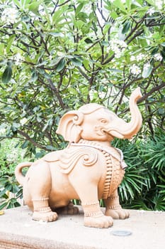 Elephant statue decorated green garden of tropical resort