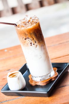 Espresso and milk in iced coffee latte