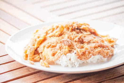 Classical dish of plain egg omelet and rice