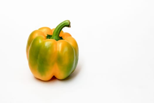 Greenish yellow, fleshy capsicum, isolated on white background