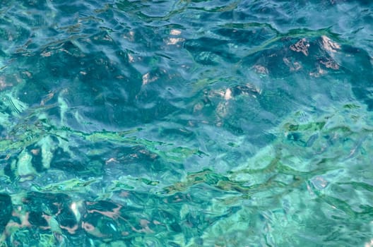 Blue Still Sea Water With Ripple. Natural Background Photo Texture