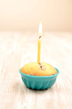 Birthday cake with one candle light