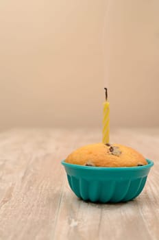 Birthday cake with one candle light