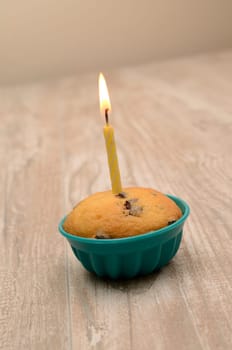 Birthday cake with one candle light