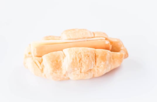 Sausage and cheese croissant isolated on white background