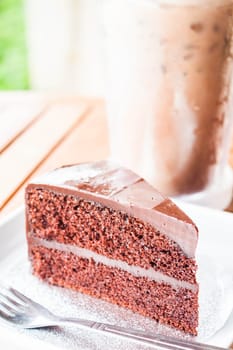 Bitter sweet meal with iced coffee and chocolate cake