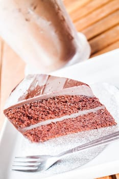 Bitter sweet meal with cold coffee and chocolate cake