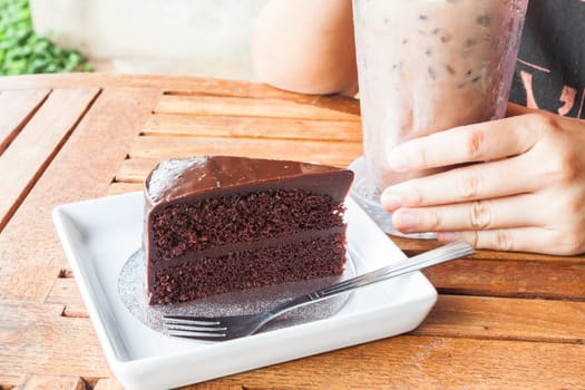 Chill time with iced coffee and chocolate cake