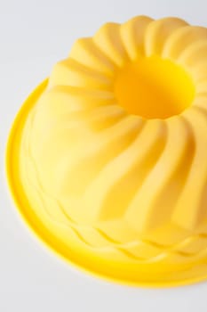 Modern silicone cake form isolated on white background, stock photo