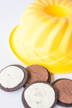 Sweet cookies and cake form on white background, stock photo