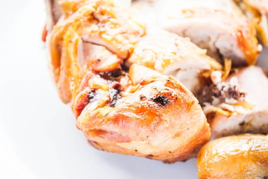 Chicken grilled serving on white dish, stock photo