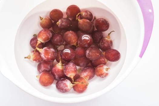 Grape fruit sank water for cleaning, stock photo