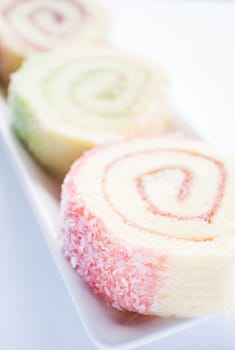 Colorful jam roll cakes  up close, stock photo