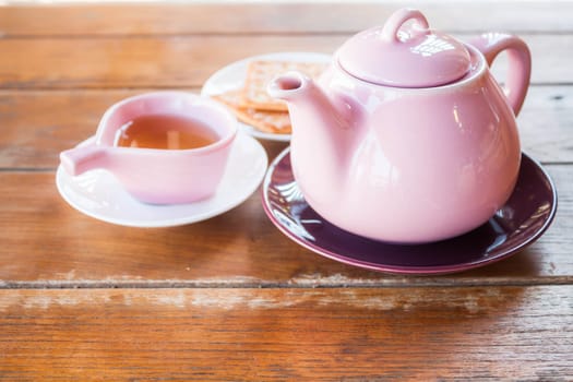 Cup of tea with teapot, stock photo