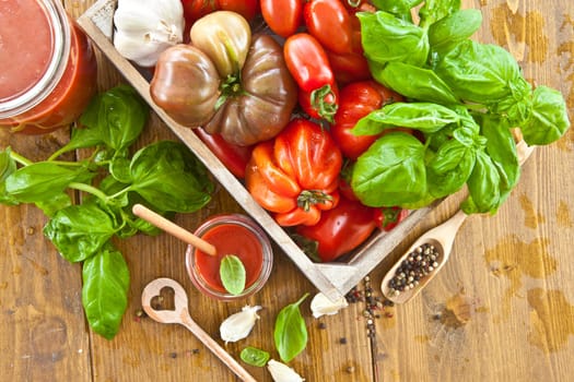 Homemade tomato sauce with fresh tomatoes and kraeuterns