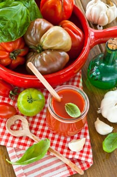 Homemade tomato sauce with fresh tomatoes and kraeuterns