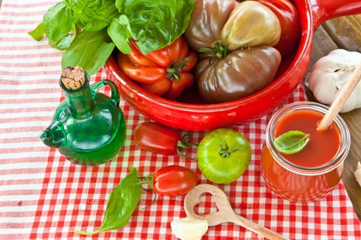 Homemade tomato sauce with fresh tomatoes and kraeuterns