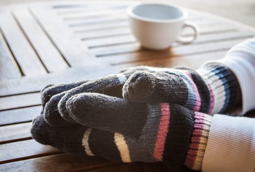 Coffee bar customer hands in winter, stock photo
