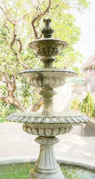 Vintage fountain in the garden, stock photo