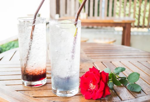 Healthy herb drinks serving on wood table, stock photo
