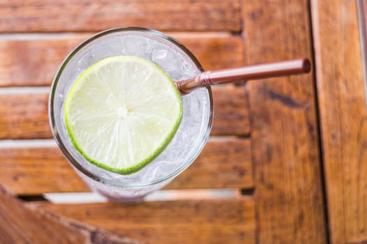 Glass of iced lemon juice up close, stock photo