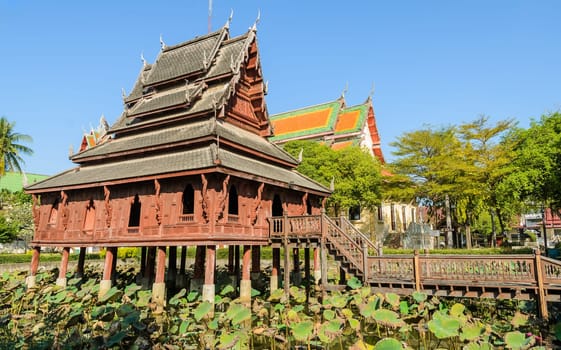 Thai wooden temple of Wat Thung Si Muang in Ubon Ratchathani, Thailand