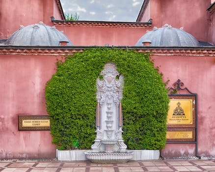 exterior of a turkish bath next to the famous hagia sofia in istanbul. A turkish bath or hammam is a variant of a steambath, distinguished by a focus on water