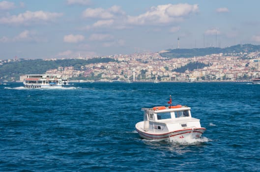 boat at the golden horn, a horn-shaped estuary, and a major urban waterway. It is also the primary inlet of the Bosphorus.