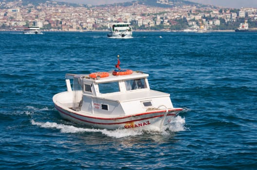 boat at the golden horn, a horn-shaped estuary, and a major urban waterway. It is also the primary inlet of the Bosphorus.