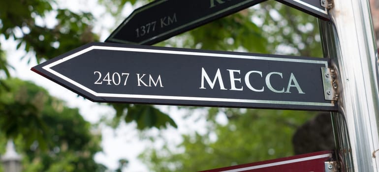 signpost with distance to Mecca in Istanbul, turkey