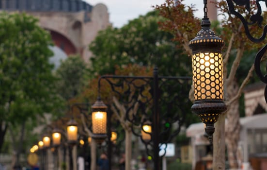 row of lanterns at evening