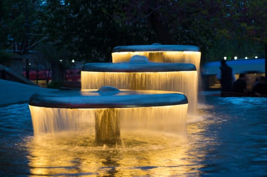 three illuminated water cascades in istanbul, turkey