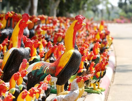 statues cocks